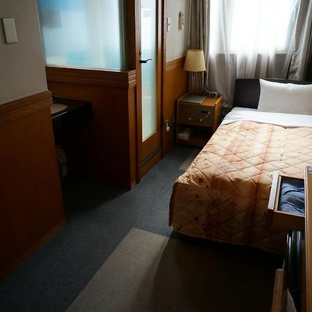 Business Hotel Crescent Токио Экстерьер фото